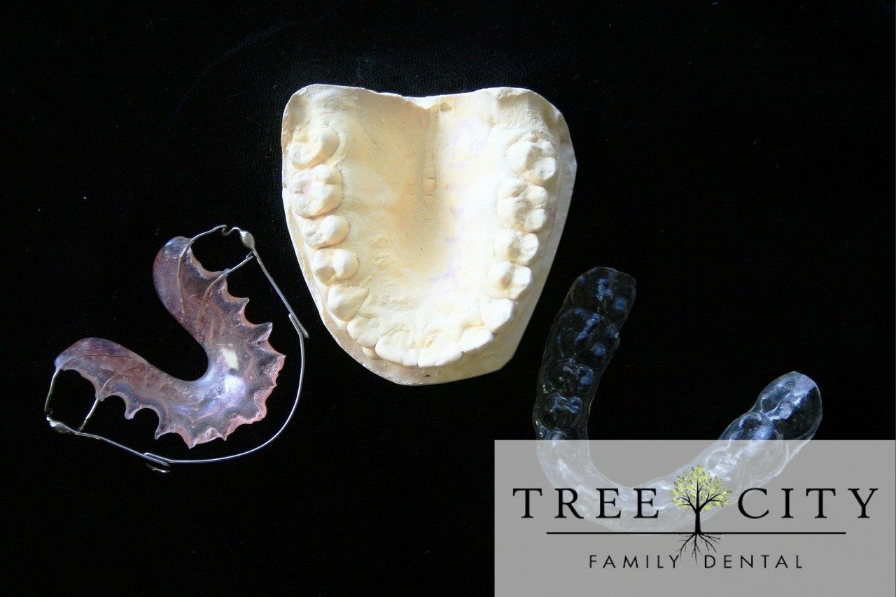 Dental retainer, mold, and mouthpiece with black background