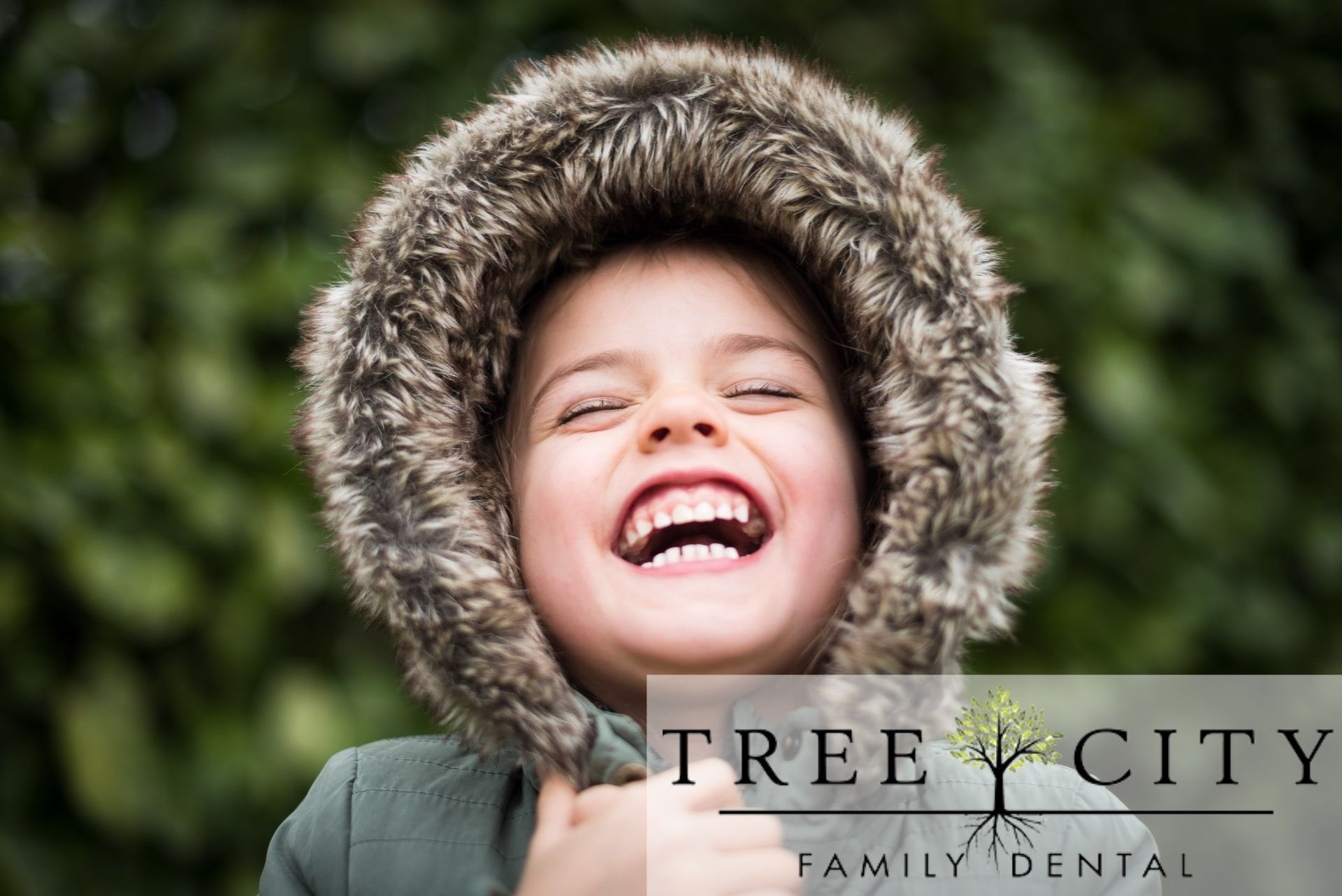 Kid laughing in a fur jacket